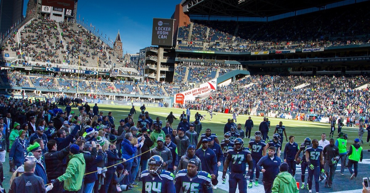 Seattle Seahawks players walk off the field after warm-ups before a 2014 home game against the 49ers in Seattle
