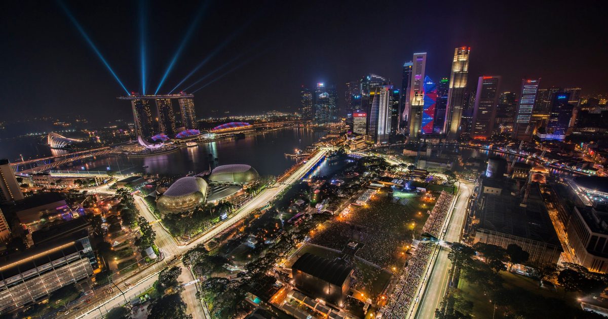 Aerial night view of the Marina Bay Street Circuit during the 2012 Singapore Grand Prix, with the city skyline behind